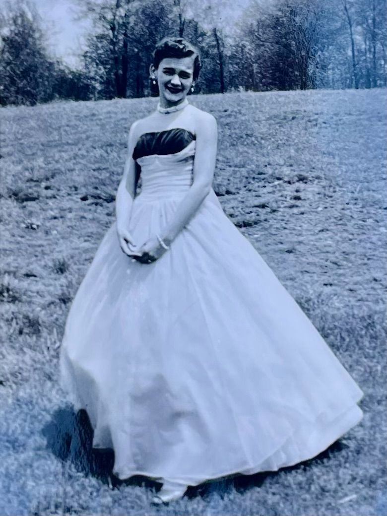 Mary, ready for a dance, in a hand-sewn dress