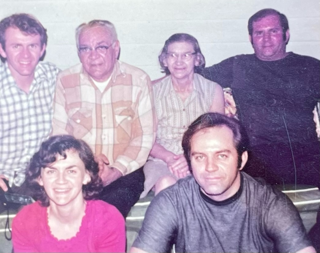 Mary and Gus visiting with her brothers and her parents