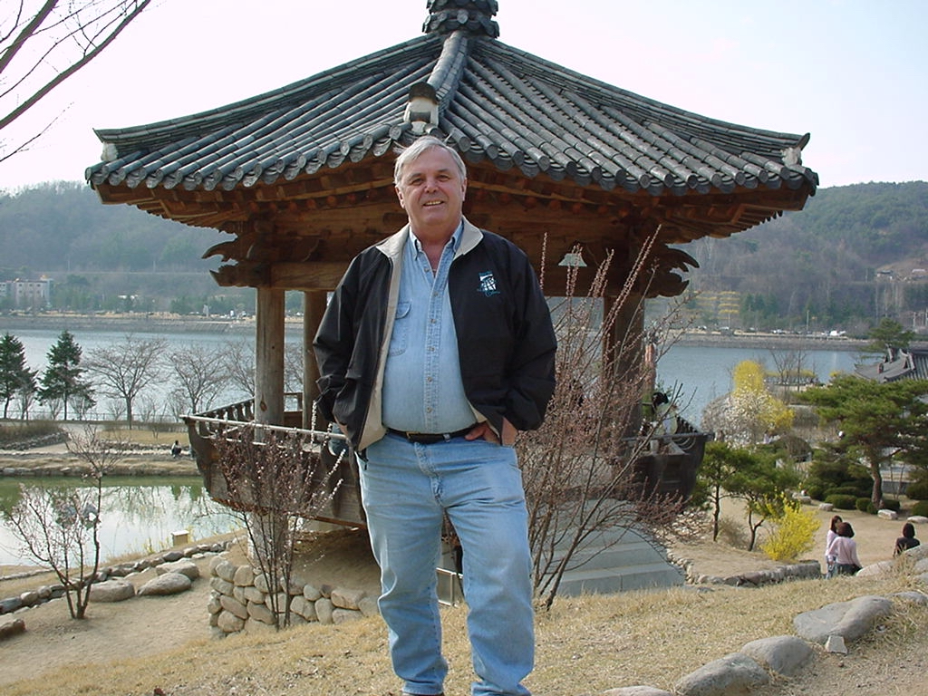 Karl standing near the Andong Dam on the Nakdong River in South Korea